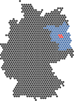 Karte von Deutschland bei der Berlin rot und Brandenburg blau markiert ist.